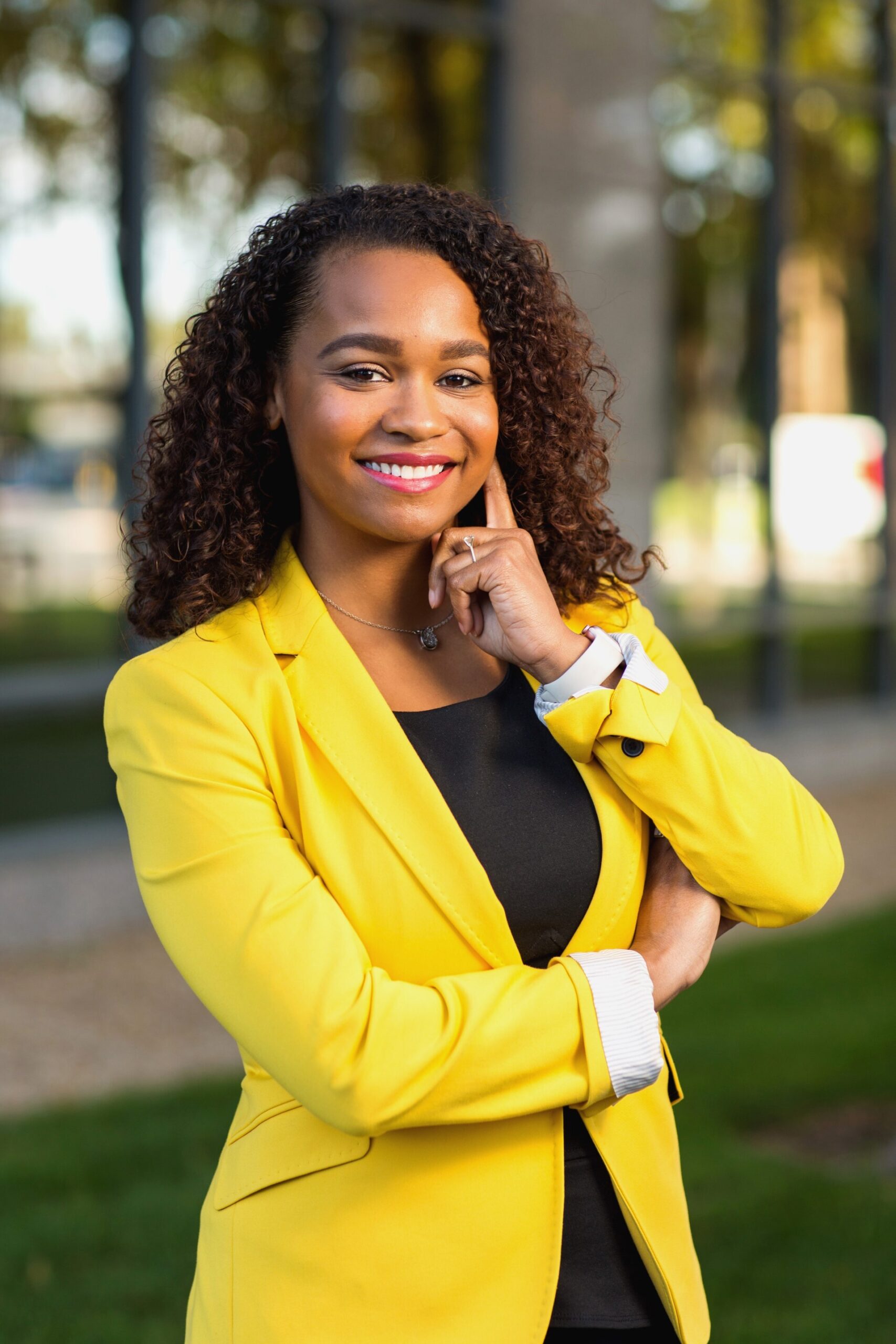 Leslie Johnson headshot at a park outside